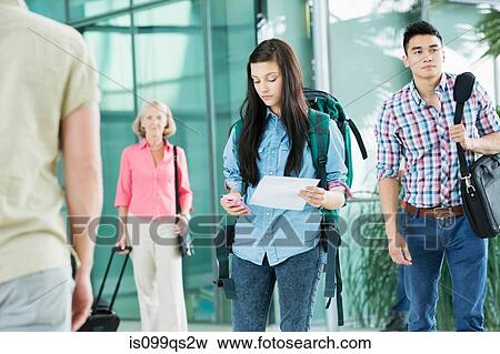 Young female backpacker in airport View Large Photo Image Stock Photo - Young female backpacker in airport. Fotosearch