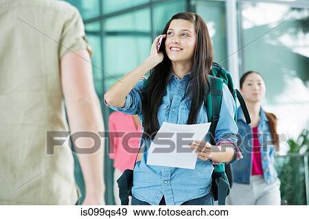 Young female backpacker in airport View Large Photo Image Stock Photo - Young female backpacker in airport. Fotosearch