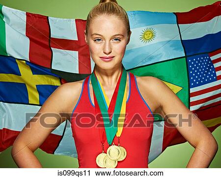 Young woman in front of international flags wearing medals View Large Photo Image Stock Image - Young woman in front of international flags wearing medals. Fotosearch
