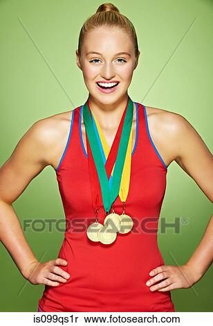 Stock Photography - Young woman wearing medals. Fotosearch