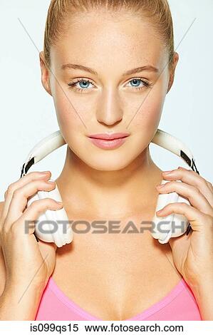Young woman with headphones View Large Photo Image Stock Photography - Young woman with headphones. Fotosearch