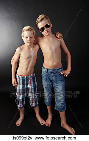 Brothers with arms around each other View Large Photo Image Stock Photo - Brothers with arms around each other. Fotosearch