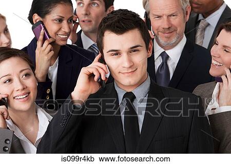 Businesspeople on cell phones View Large Photo Image Stock Image - Businesspeople on cell phones. Fotosearch