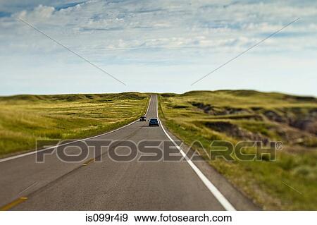 Cars on open road, Wyoming, USA View Large Photo Image Stock Photo - Cars on open road, Wyoming, USA. Fotosearch