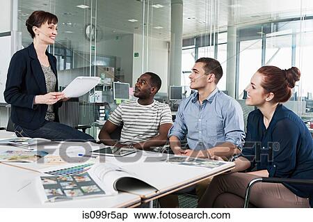 Colleagues planning during creative meeting View Large Photo Image Stock Photography - Colleagues planning during creative meeting. Fotosearch