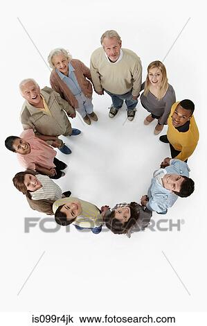 Stock Image - Group of people in a circle, high angle view. Fotosearch