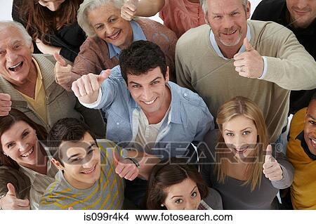 Picture - Group of people looking at camera with thumbs up, high angle. Fotosearch