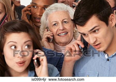 Stock Photography - Group of people on cell phones. Fotosearch