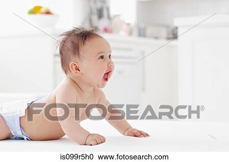 Stock Image - Happy baby girl. Fotosearch
