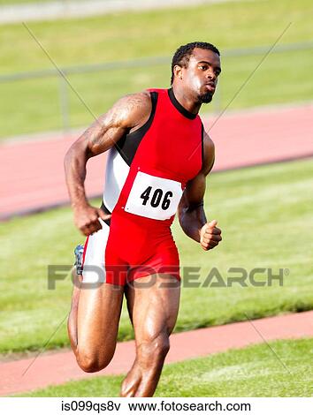 Stock Photo - Male athlete running on track. Fotosearch