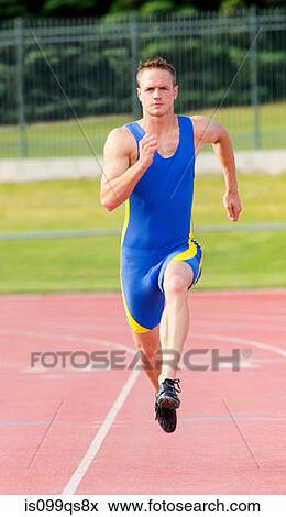 Male athlete running on track View Large Photo Image Stock Photo - Male athlete running on track. Fotosearch