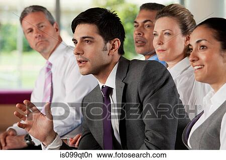 Mature students in class, man speaking View Large Photo Image Picture - Mature students in class, man speaking. Fotosearch