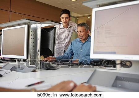 Mature students in computer class View Large Photo Image Picture - Mature students in computer class. Fotosearch
