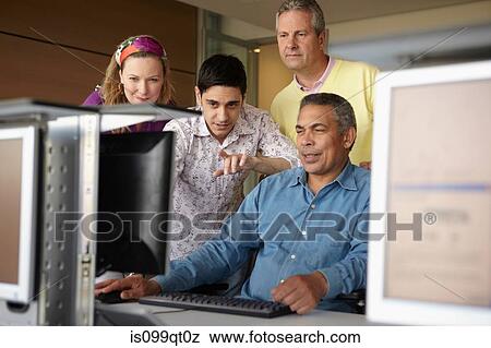 Stock Photo - Mature students in computer class. Fotosearch