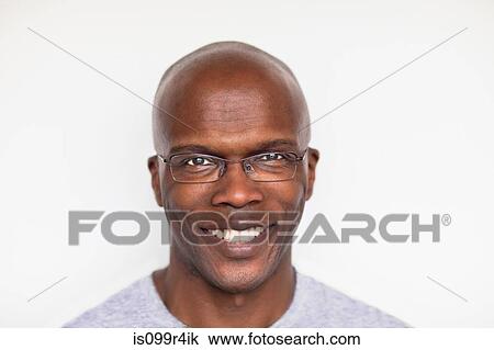 Portrait of a bald man smiling View Large Photo Image Stock Image - Portrait of a bald man smiling. Fotosearch