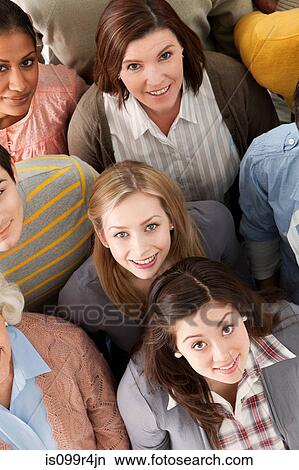 Picture - Portrait of group of people looking at camera, high angle. Fotosearch