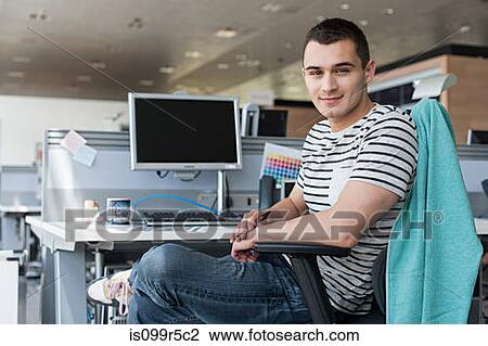 Portrait of man at desk View Large Photo Image Stock Image - Portrait of man at desk. Fotosearch