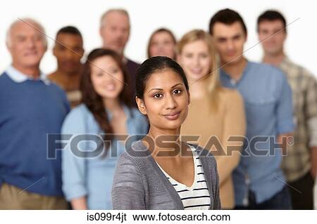 Portrait of woman with group of people in background View Large Photo Image Stock Photograph - Portrait of woman with group of people in background. Fotosearch