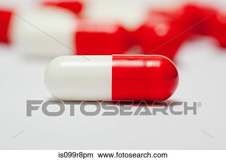 Picture - Red and white capsules. Fotosearch
