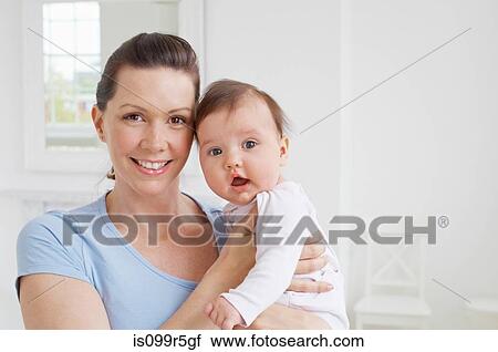 Woman and baby girl View Large Photo Image Stock Image - Woman and baby girl. Fotosearch