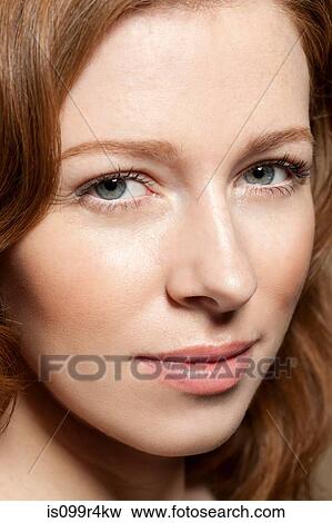 Woman looking at camera, close up View Large Photo Image Stock Photo - Woman looking at camera, close up. Fotosearch