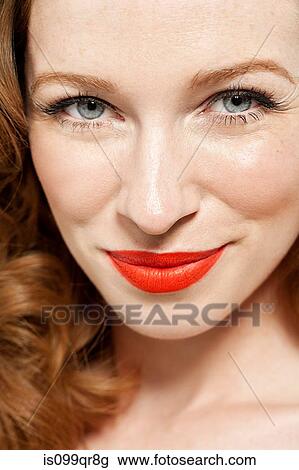 Woman wearing red lipstick View Large Photo Image Stock Image - Woman wearing red lipstick. Fotosearch