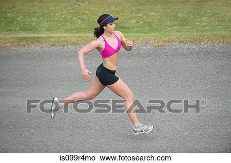 Young woman running View Large Photo Image Picture - Young woman running. Fotosearch