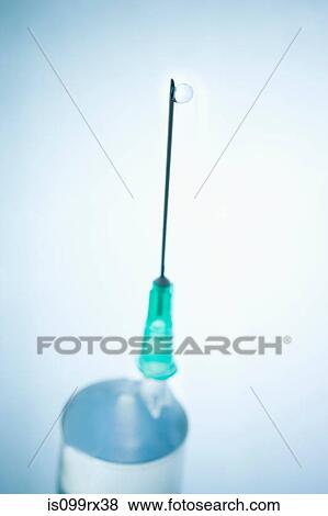Droplet on syringe View Large Photo Image Stock Photo - Droplet on syringe. Fotosearch