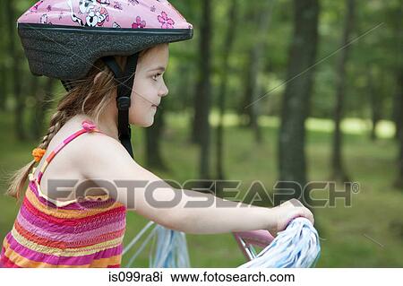 Girl cycling View Large Photo Image Stock Image - Girl cycling. Fotosearch