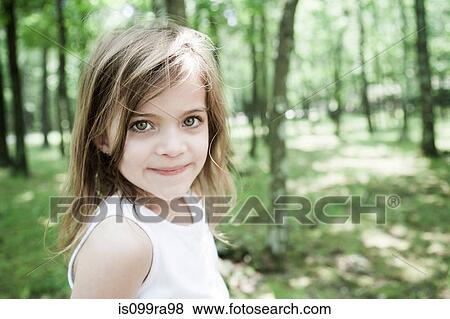 Girl in forest View Large Photo Image Stock Photo - Girl in forest. Fotosearch