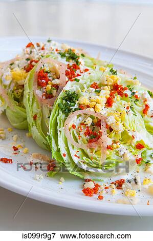 Stock Photo - Iceberg lettuce salad. Fotosearch