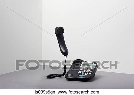 Landline office phone off the hook View Large Photo Image Picture - Landline office phone off the hook. Fotosearch