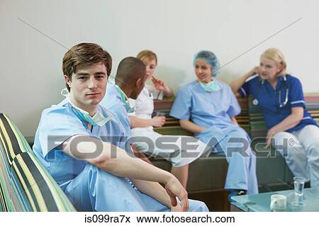 Stock Photo - Medical staff in hospital staff room. Fotosearch