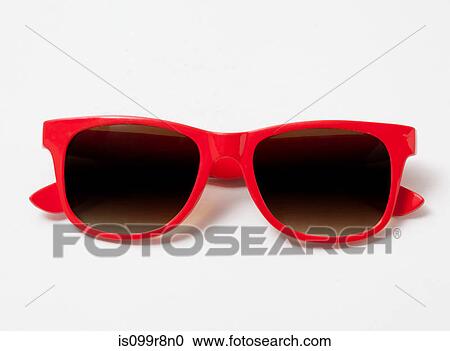Stock Image - Pair of red sunglasses. Fotosearch