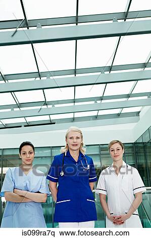 Portrait of medical staff in hospital View Large Photo Image Stock Photography - Portrait of medical staff in hospital. Fotosearch