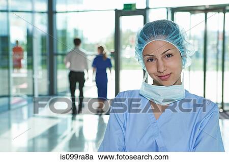 Portrait of surgeon in hospital foyer View Large Photo Image Stock Image - Portrait of surgeon in hospital foyer. Fotosearch