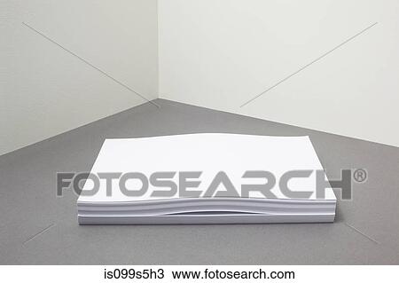 Stack of paper with something inside View Large Photo Image Stock Image - Stack of paper with something inside. Fotosearch