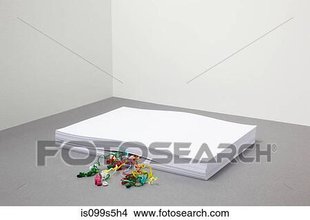 Stack of paper with streamers inside View Large Photo Image Picture - Stack of paper with streamers inside. Fotosearch