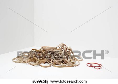 Stack of rubber bands with two red rubber bands View Large Photo Image Stock Image - Stack of rubber bands with two red rubber bands. Fotosearch
