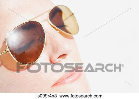 Woman's face in sunlight View Large Photo Image Stock Image - Woman's face in sunlight. Fotosearch