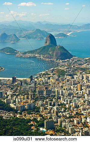 Aerial view of Rio de Janeiro cityscape and Sugarloaf Mountain, Brazil View Large Photo Image Stock Image - Aerial view of Rio de Janeiro cityscape and Sugarloaf Mountain, Brazil. Fotosearch