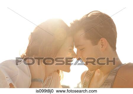 Affectionate young couple, portrait View Large Photo Image Stock Image - Affectionate young couple, portrait. Fotosearch