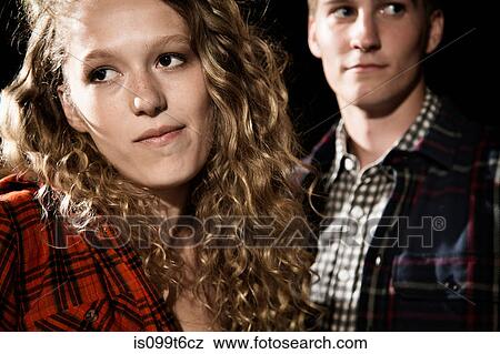 Couple close up, girl looking away View Large Photo Image Stock Photo - Couple close up, girl looking away. Fotosearch