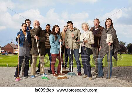 Group of people standing with brooms and mop View Large Photo Image Stock Photography - Group of people standing with brooms and mop. Fotosearch