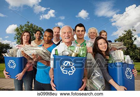 Group of people with recycling in bins View Large Photo Image Stock Photograph - Group of people with recycling in bins. Fotosearch