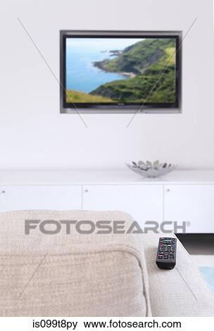 Living room with television and sofa View Large Photo Image Stock Photo - Living room with television and sofa. Fotosearch