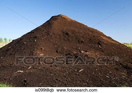 Mound of topsoil in commercial sandpit View Large Photo Image Stock Image - Mound of topsoil in commercial sandpit. Fotosearch