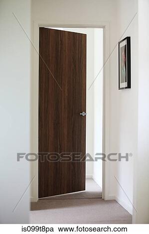 Open door leading off hallway View Large Photo Image Stock Image - Open door leading off hallway. Fotosearch