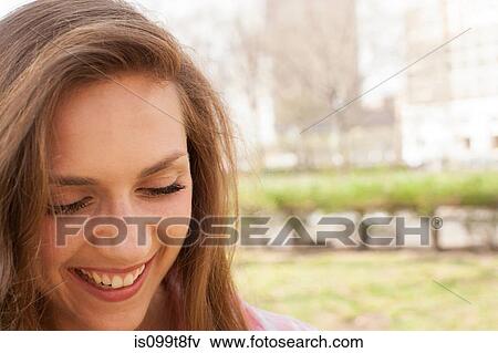 Portrait of a young woman View Large Photo Image Stock Photo - Portrait of a young woman. Fotosearch