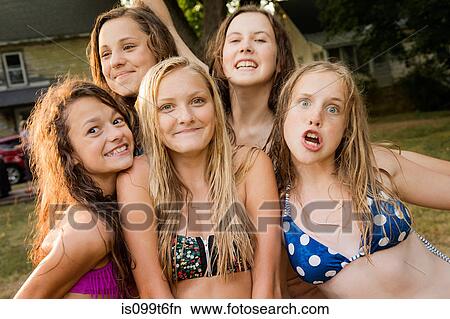 Portrait of five girls wearing bikini tops View Large Photo Image Picture - Portrait of five girls wearing bikini tops. Fotosearch
